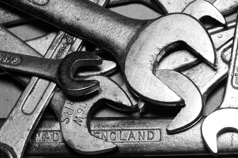 mechanic inspecting engine bay